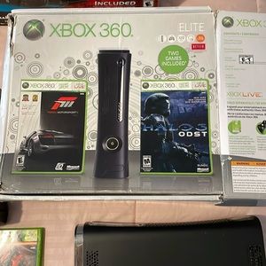 XBOX 360, with all wires accessories and 6 free games.